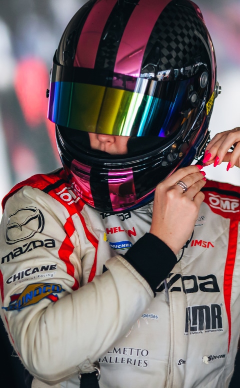 Mazda MX-5 Cup Racer Putting on Helmet