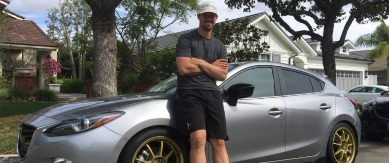 Major League Baseball’s CJ Wilson with his Mazda 3