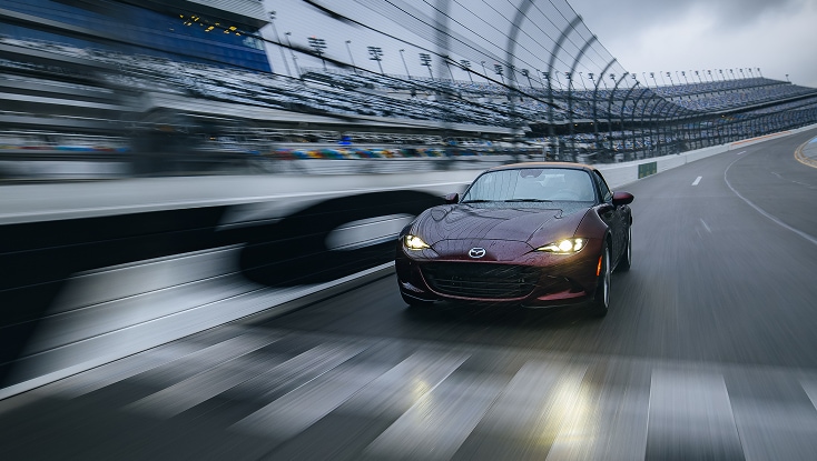 2025 Mazda MX-5 Miata 35th Anniversary Edition Crossing the Finish Line on a Racetrack