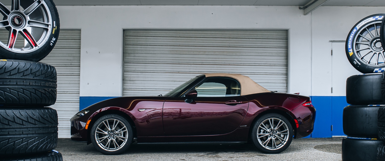 2025 Mazda MX-5 Miata 35th Anniversary Edition in Front of a Garage