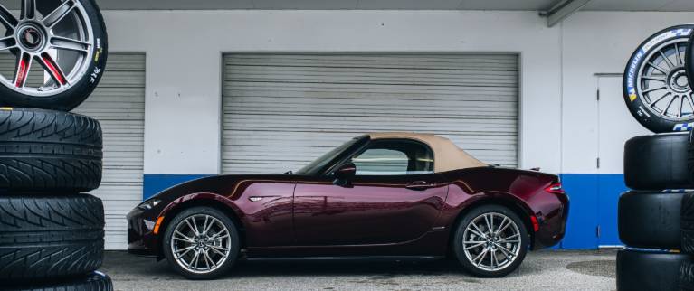 2025 Mazda MX-5 Miata 35th Anniversary Edition in Front of a Garage