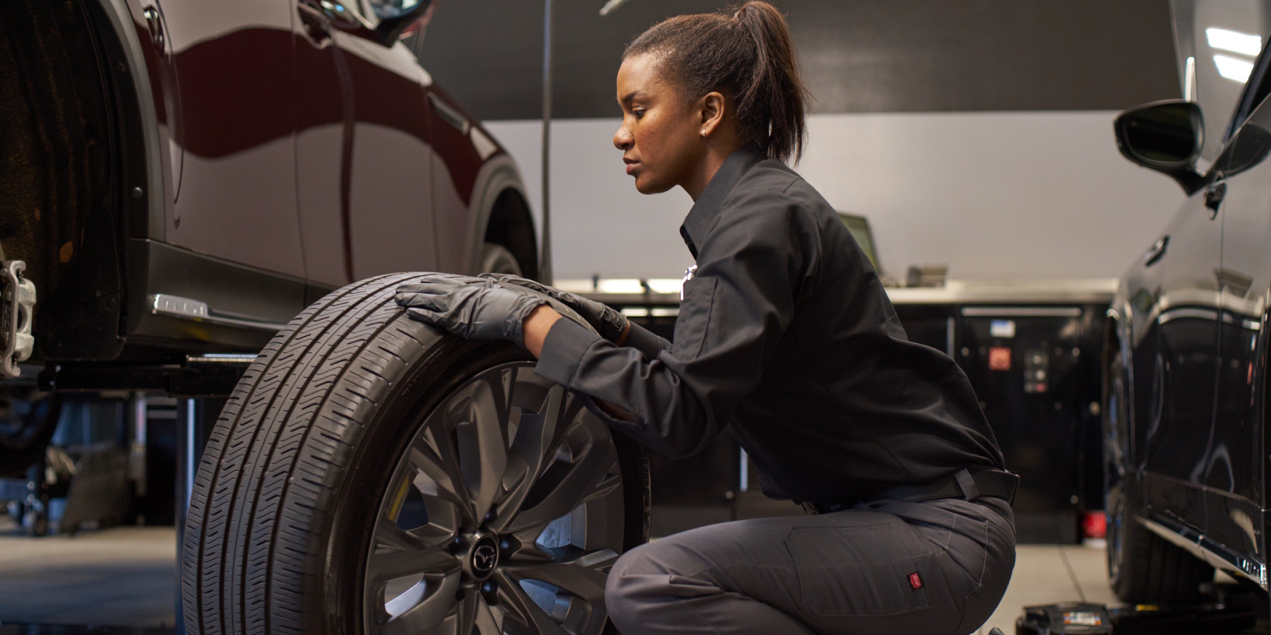 Automotive Technician replacing tire